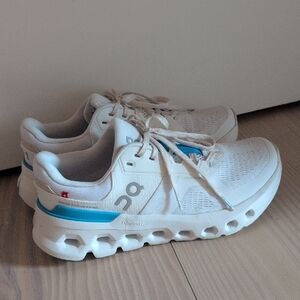 On Running White Sneakers with Blue Accents